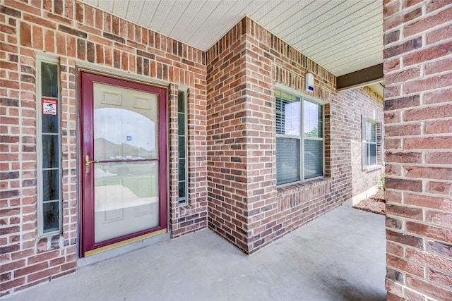 19700 San Chisolm Dr, Round Rock, TX 78664 - property entrance featuring brick siding and a porch