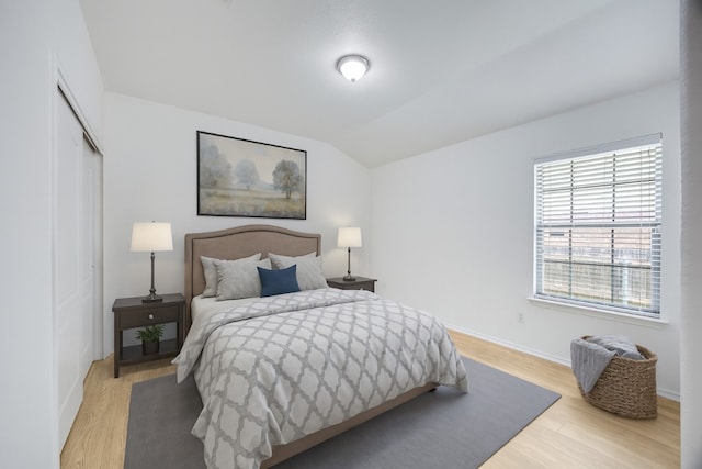 19700 San Chisolm Dr, Round Rock, TX 78664 - bedroom featuring light wood-style floors, a closet, and lofted ceiling