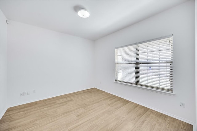 19700 San Chisolm Dr, Round Rock, TX 78664 - unfurnished room with wood finished floors and baseboards