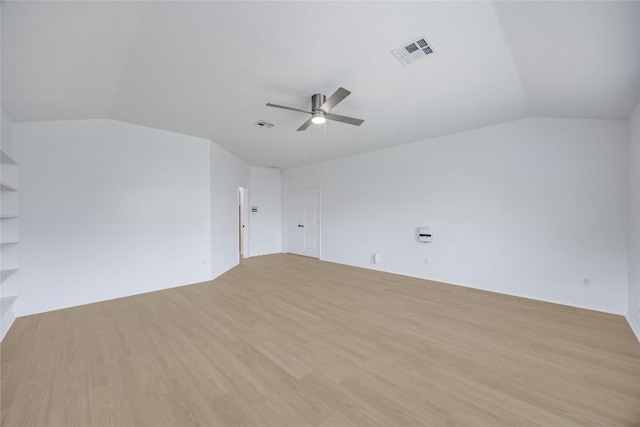 19700 San Chisolm Dr, Round Rock, TX 78664 - unfurnished room featuring vaulted ceiling, a ceiling fan, and light wood finished floors