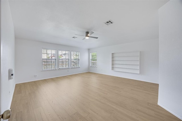 19700 San Chisolm Dr, Round Rock, TX 78664 - spare room featuring ceiling fan and light wood-type flooring