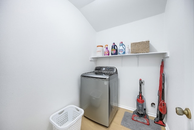 19700 San Chisolm Dr, Round Rock, TX 78664 - laundry room featuring washer / dryer and light wood finished floors