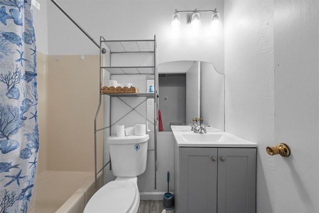 1211 S 17th St, Temple, TX 76504 - full bath with vanity, shower / tub combo with curtain, and wood finished floors