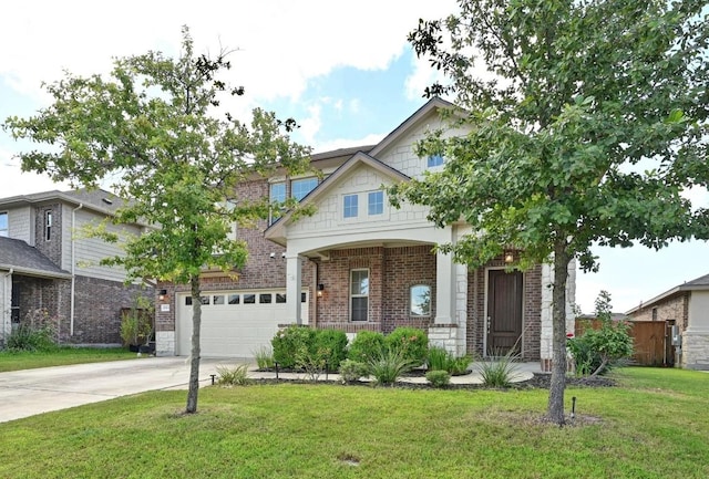 19113 Melwas Way, Pflugerville, TX 78660 - view of front of home with brick siding, a front yard, concrete driveway, a garage, and covered porch