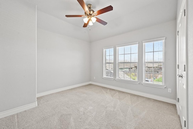 19113 Melwas Way, Pflugerville, TX 78660 - spare room featuring light colored carpet, ceiling fan, and vaulted ceiling