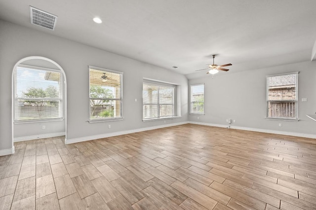 19113 Melwas Way, Pflugerville, TX 78660 - unfurnished living room featuring ceiling fan, light wood-type flooring, and recessed lighting
