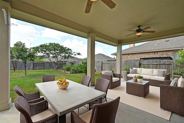 19113 Melwas Way, Pflugerville, TX 78660 - fenced backyard with a ceiling fan, an outdoor hangout area, a patio area, and outdoor dining space