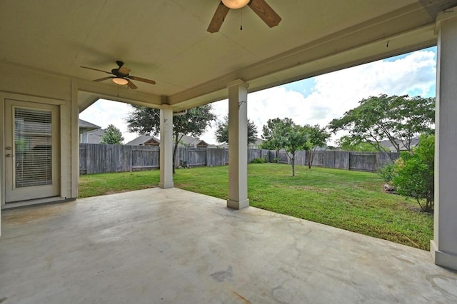 19113 Melwas Way, Pflugerville, TX 78660 - fenced backyard with a ceiling fan and a patio area
