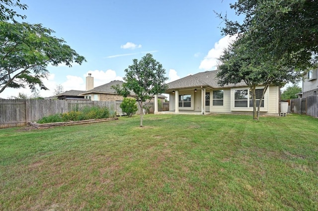 19113 Melwas Way, Pflugerville, TX 78660 - back of house featuring a fenced backyard and a patio