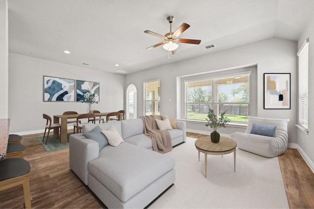19113 Melwas Way, Pflugerville, TX 78660 - living area featuring wood finished floors, plenty of natural light, a ceiling fan, and recessed lighting