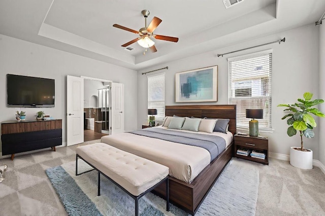 19113 Melwas Way, Pflugerville, TX 78660 - carpeted bedroom featuring a raised ceiling and ceiling fan