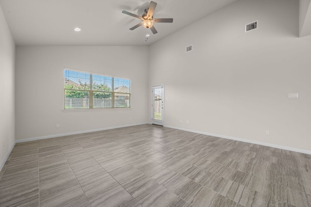205 Falkland St, Hutto, TX 78634 - empty room featuring a ceiling fan, high vaulted ceiling, and recessed lighting