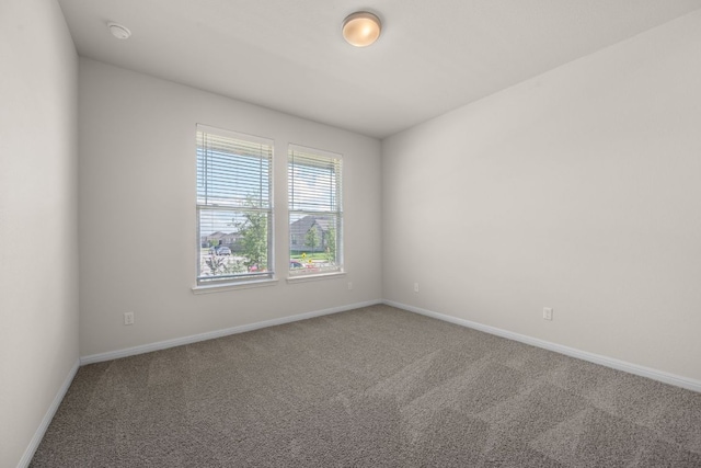 205 Falkland St, Hutto, TX 78634 - carpeted spare room featuring baseboards