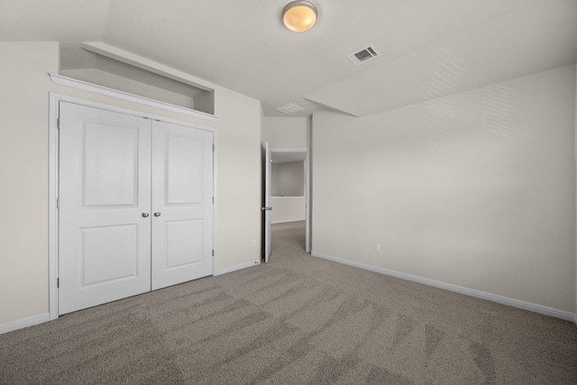 205 Falkland St, Hutto, TX 78634 - unfurnished bedroom with carpet floors and a closet