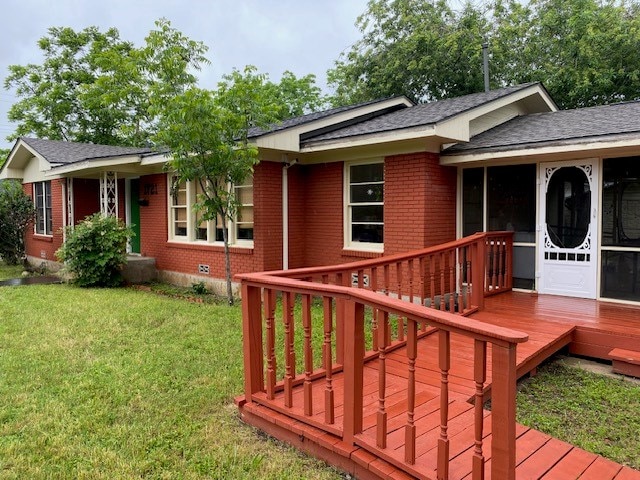 1721 E 32nd St, Austin, TX 78722 - wooden deck featuring a yard