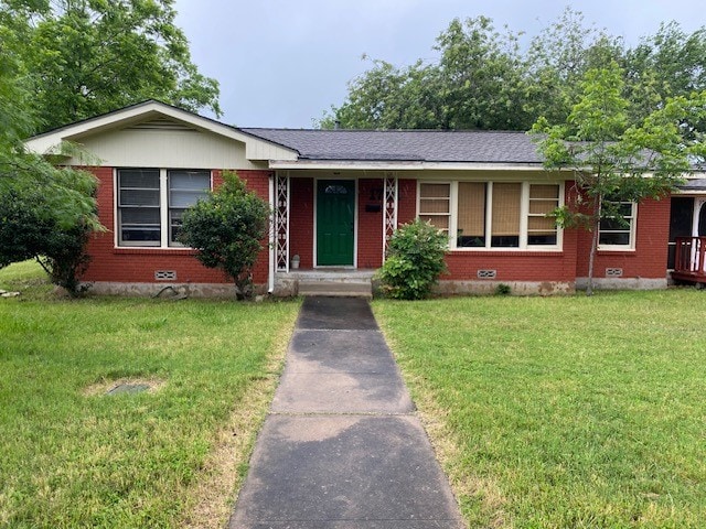 1721 E 32nd St, Austin, TX 78722 - ranch-style house featuring brick siding, a front yard, and crawl space