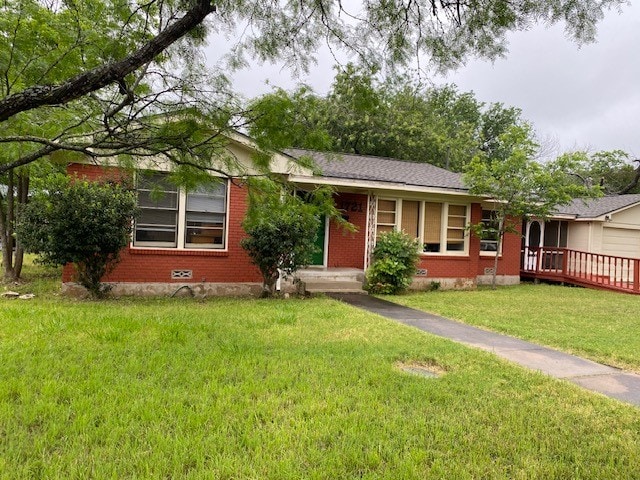 1721 E 32nd St, Austin, TX 78722 - ranch-style house featuring a front yard and brick siding