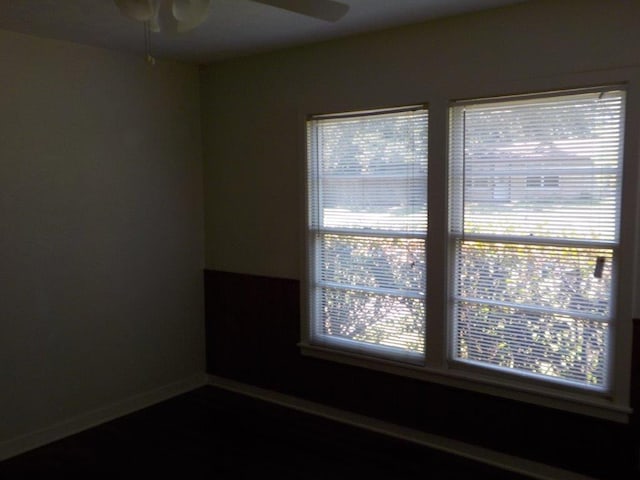 1721 E 32nd St, Austin, TX 78722 - empty room featuring a ceiling fan and baseboards