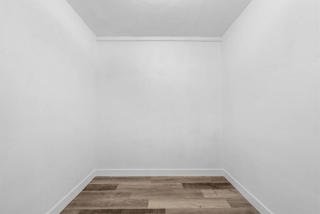 1524 E E Ave B, Temple, TX 76501 - spare room featuring baseboards and wood finished floors