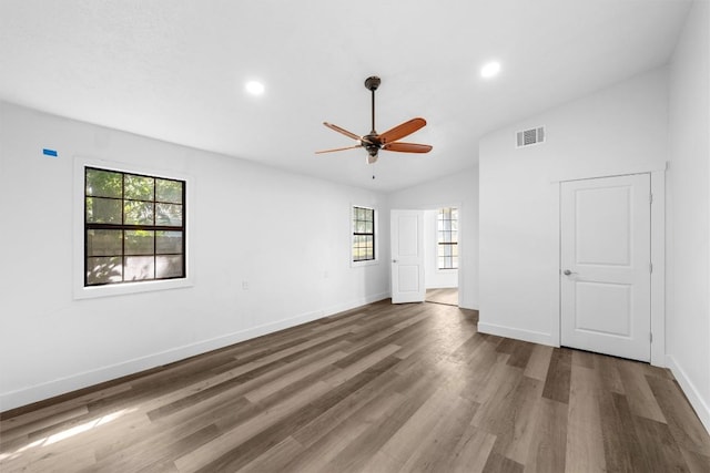 1524 E E Ave B, Temple, TX 76501 - unfurnished bedroom with multiple windows, lofted ceiling, wood finished floors, recessed lighting, and a ceiling fan