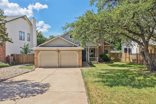 8204 Cahill Dr, Austin, TX 78729 - view of front facade with a garage, brick siding, and concrete driveway