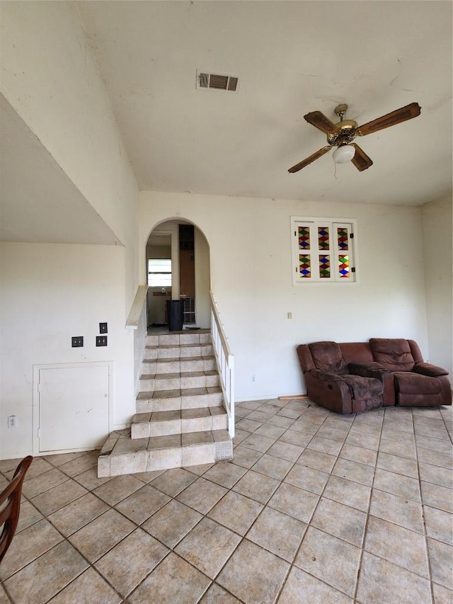 0 Monte Vista Dr, Burnet, TX 78611 - staircase with arched walkways, tile patterned flooring, and a ceiling fan