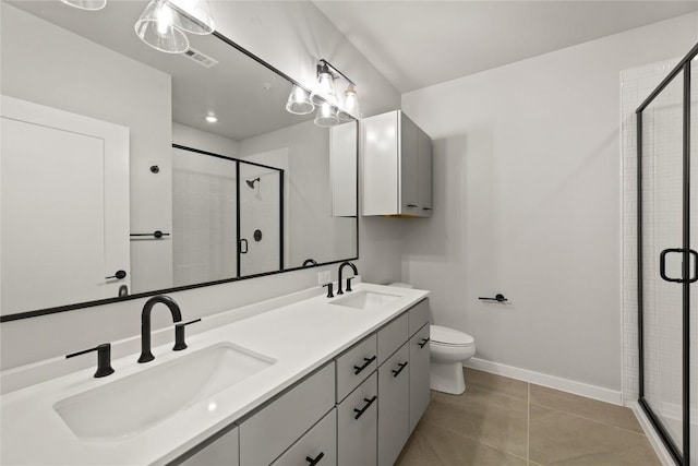 4510 Terry-O Ln Unit 139, Austin, TX 78745 - full bathroom with double vanity, a shower stall, and tile patterned flooring