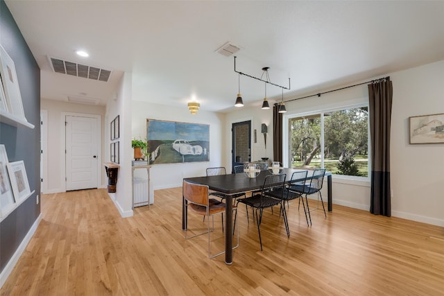 112 Louisiana Ave, New Braunfels, TX 78130 - dining area with light wood finished floors and baseboards