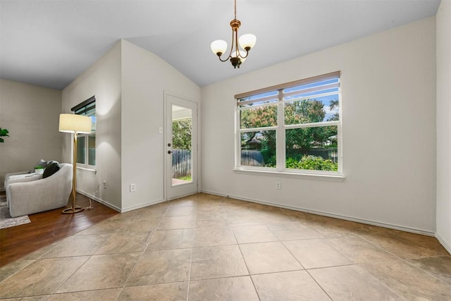 3305 Blue Ridge Dr, Round Rock, TX 78681 - spare room featuring lofted ceiling and a chandelier