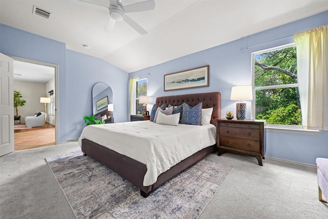3305 Blue Ridge Dr, Round Rock, TX 78681 - carpeted bedroom featuring multiple windows, vaulted ceiling, and a ceiling fan