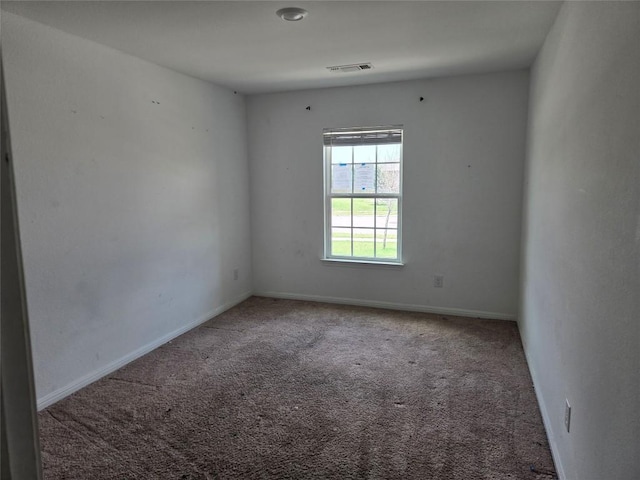 16416 Farmhouse Ln, Elgin, TX 78621 - carpeted spare room with baseboards