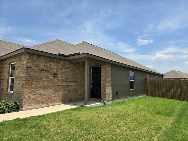 16416 Farmhouse Ln, Elgin, TX 78621 - rear view of house featuring brick siding