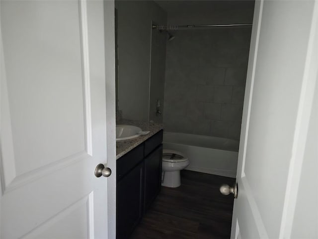 16416 Farmhouse Ln, Elgin, TX 78621 - bathroom with vanity, wood finished floors, and shower / tub combination