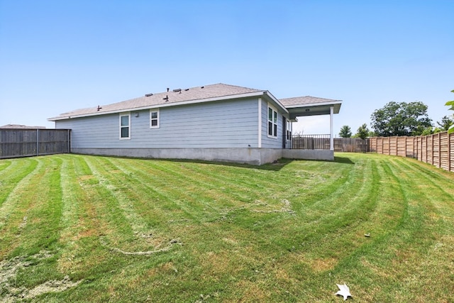 337 Spiny Lizard Ln, San Marcos, TX 78666 - rear view of property with a fenced backyard