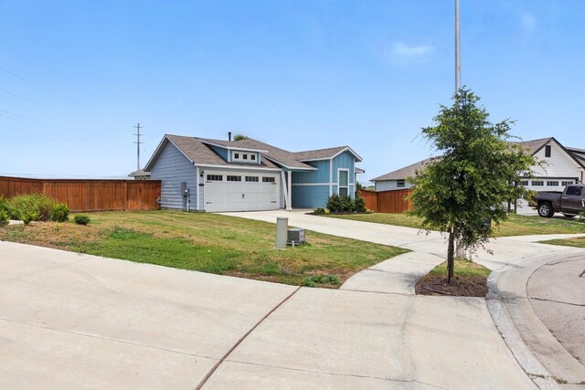 337 Spiny Lizard Ln, San Marcos, TX 78666 - view of front facade featuring concrete driveway and a garage