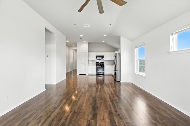 337 Spiny Lizard Ln, San Marcos, TX 78666 - unfurnished living room featuring dark wood-style flooring, ceiling fan, lofted ceiling, and recessed lighting