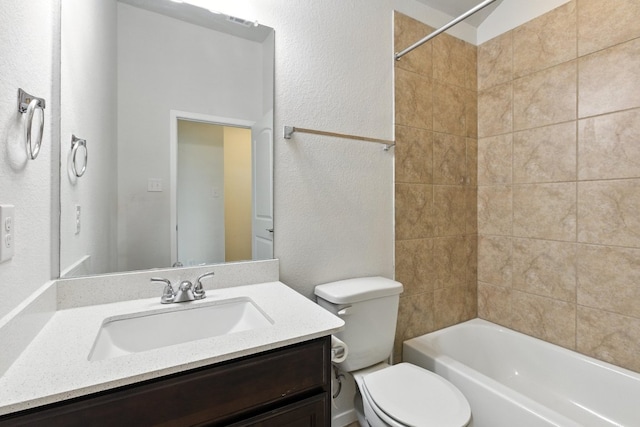 337 Spiny Lizard Ln, San Marcos, TX 78666 - bathroom featuring vanity, a textured wall, and shower / washtub combination