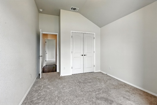 337 Spiny Lizard Ln, San Marcos, TX 78666 - unfurnished bedroom featuring carpet floors, lofted ceiling, and a closet