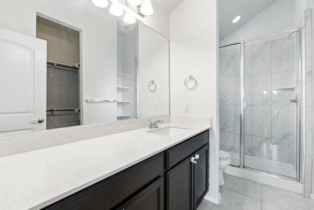 337 Spiny Lizard Ln, San Marcos, TX 78666 - full bath with a marble finish shower, vanity, tile patterned floors, a spacious closet, and lofted ceiling