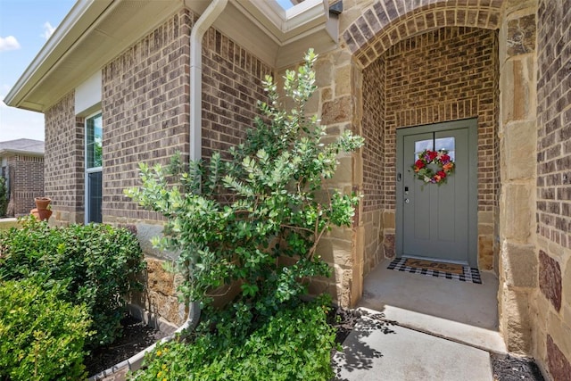 316 Shiner Ln, Georgetown, TX 78626 - view of exterior entry featuring brick siding