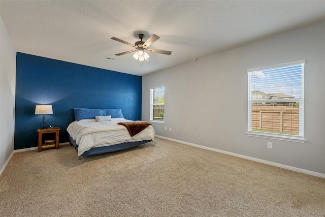 316 Shiner Ln, Georgetown, TX 78626 - bedroom featuring carpet flooring and a ceiling fan