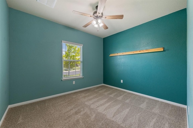 316 Shiner Ln, Georgetown, TX 78626 - empty room featuring carpet flooring and a ceiling fan