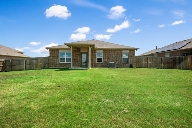 316 Shiner Ln, Georgetown, TX 78626 - back of house featuring brick siding and a fenced backyard