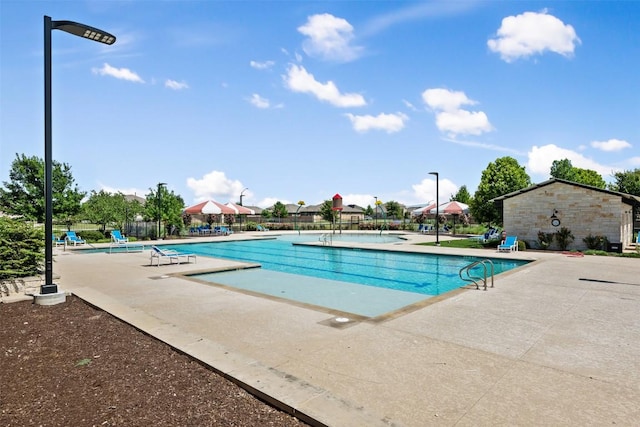 316 Shiner Ln, Georgetown, TX 78626 - community pool featuring a patio