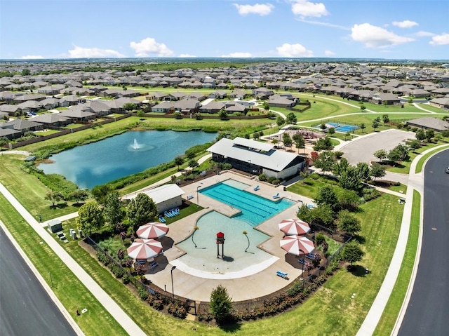 316 Shiner Ln, Georgetown, TX 78626 - aerial perspective of suburban area with a pool and a nearby body of water