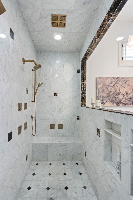 1216 Travis Bluff Way, Spicewood, TX 78669 - full bath featuring tiled shower and tile walls