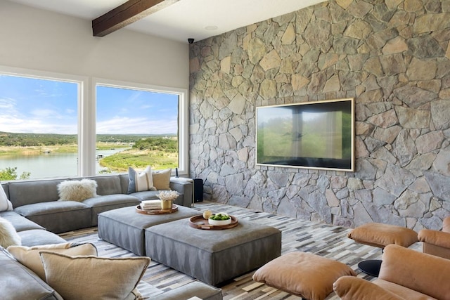 1216 Travis Bluff Way, Spicewood, TX 78669 - living area featuring beamed ceiling and a water view
