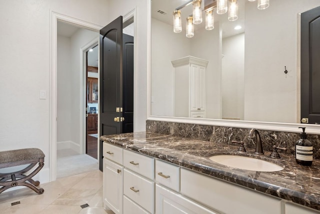 1216 Travis Bluff Way, Spicewood, TX 78669 - full bath with vanity and tile patterned floors