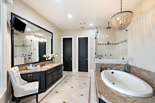 1216 Travis Bluff Way, Spicewood, TX 78669 - full bathroom with a stall shower, a garden tub, vanity, tile patterned floors, and recessed lighting