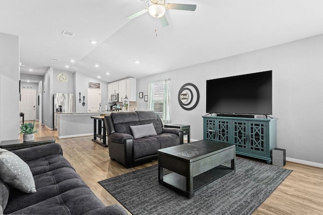 6045 Teodoro Bnd, Round Rock, TX 78665 - living room featuring lofted ceiling, light wood finished floors, ceiling fan, and recessed lighting